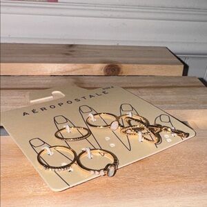 Aeropostale ring Gold toned Set of 7 NEW size 8 for Women